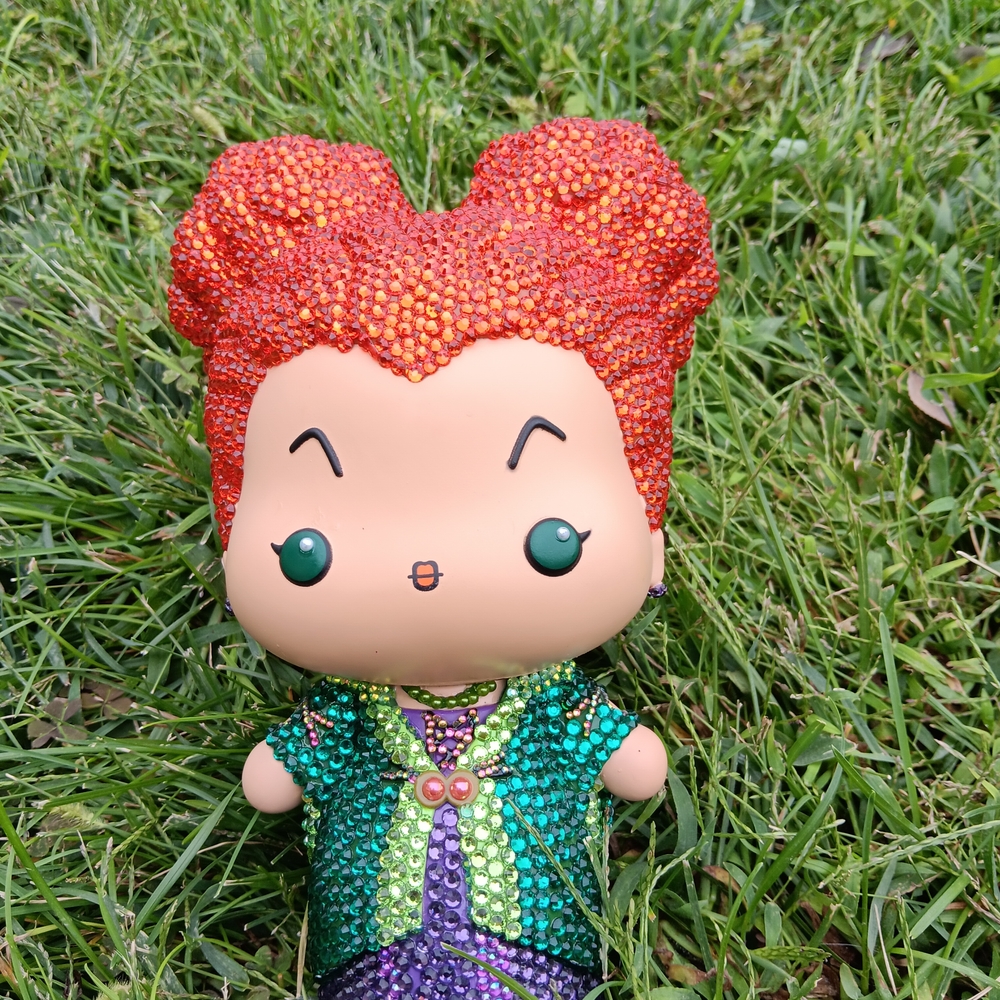 Colorful Beaded Figurine with Red Hair